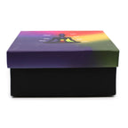Closed black box with a colorful lid featuring a meditating figure and chakra symbols, designed for the Large Buddha Singing Bowl Set- Black/Orange 14cm packaging.
