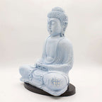 Meditation Buddha Lamp Sky Blue - Oval Stand featuring a serene hand carved resin Buddha statue with crackled texture, sitting peacefully on an oval black base.