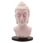 Buddha Bust Lamp Cherry Crackle - Oval stand featuring a serene pink crackle-textured Buddha head sculpture on a sleek black oval base, perfect for calming Buddha decor.