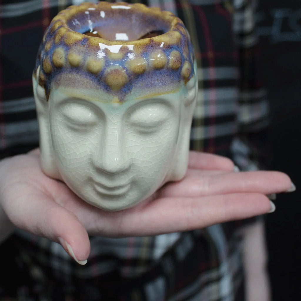 Handheld Buddha Oil Burner - Ivory & Mint with a serene face design, glazed with earthy tones, perfect for calming home decor and Buddha-inspired ambiance.