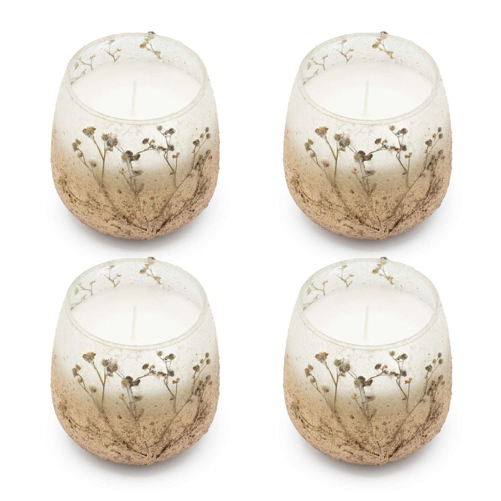 Set of four Small Glass Jar Candles - Wildlight Woods featuring delicate botanical designs in frosted glass jars with white wax inside.