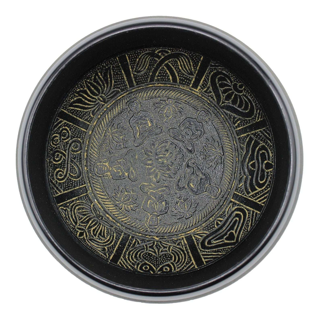 Top view of a black singing bowl with intricate gold designs featuring five Buddha figures, decorative floral and geometric patterns in the center, Extra Loud - Singing Bowl - Five Buddha.