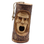 Tree Trunk Face - Bird House - Grumpy Old Man features a hand-carved wooden log with a detailed grumpy old man face, hollow mouth as the bird entry, and a rope for hanging.