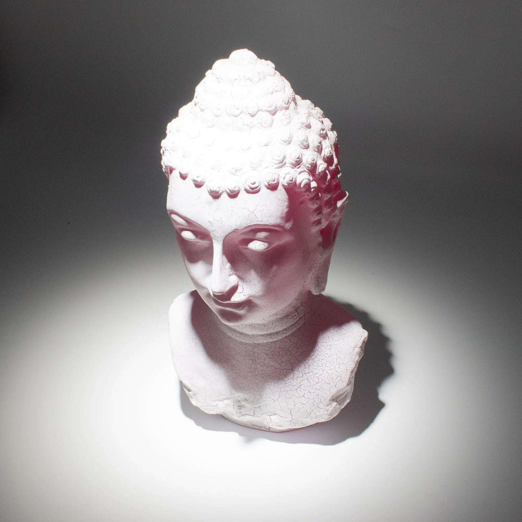 White Buddha Bust Lamp Cherry Crackle - Oval stand casting soft light with subtle cracks on textured surface, evoking calm and peaceful Buddha decor ambiance.