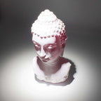White Buddha Bust Lamp Cherry Crackle - Oval stand casting soft light with subtle cracks on textured surface, evoking calm and peaceful Buddha decor ambiance.