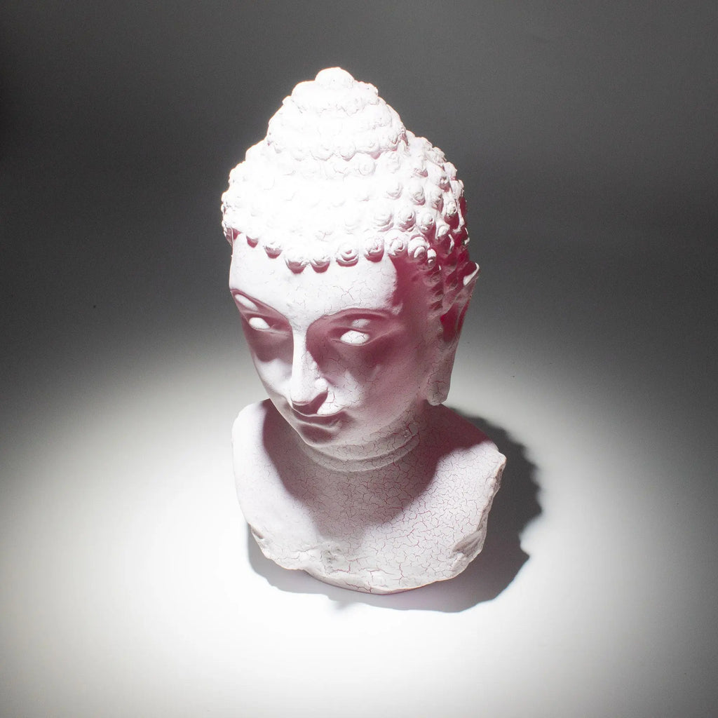 Buddha Bust Lamp Cherry Crackle - Oval stand featuring a hand-carved Buddha head with a crackled cherry finish, softly illuminated to highlight intricate details and serene expression.