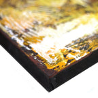 Close-up view of the textured corner of the Buddha Painting - Three Heads Black featuring abstract brushstrokes in black, white, and golden yellow tones on canvas edge.