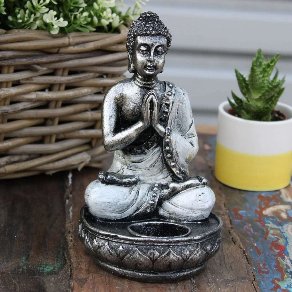 Buddha Candle Holder - White - Medium featuring a hand-carved resin Buddha statue in a seated meditation pose, designed as a serene tabletop decor piece.