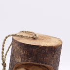 Tree Trunk Face - Bird House - Grumpy Old Man with rustic bark texture and natural wood finish, featuring a braided hanging rope for easy outdoor display.
