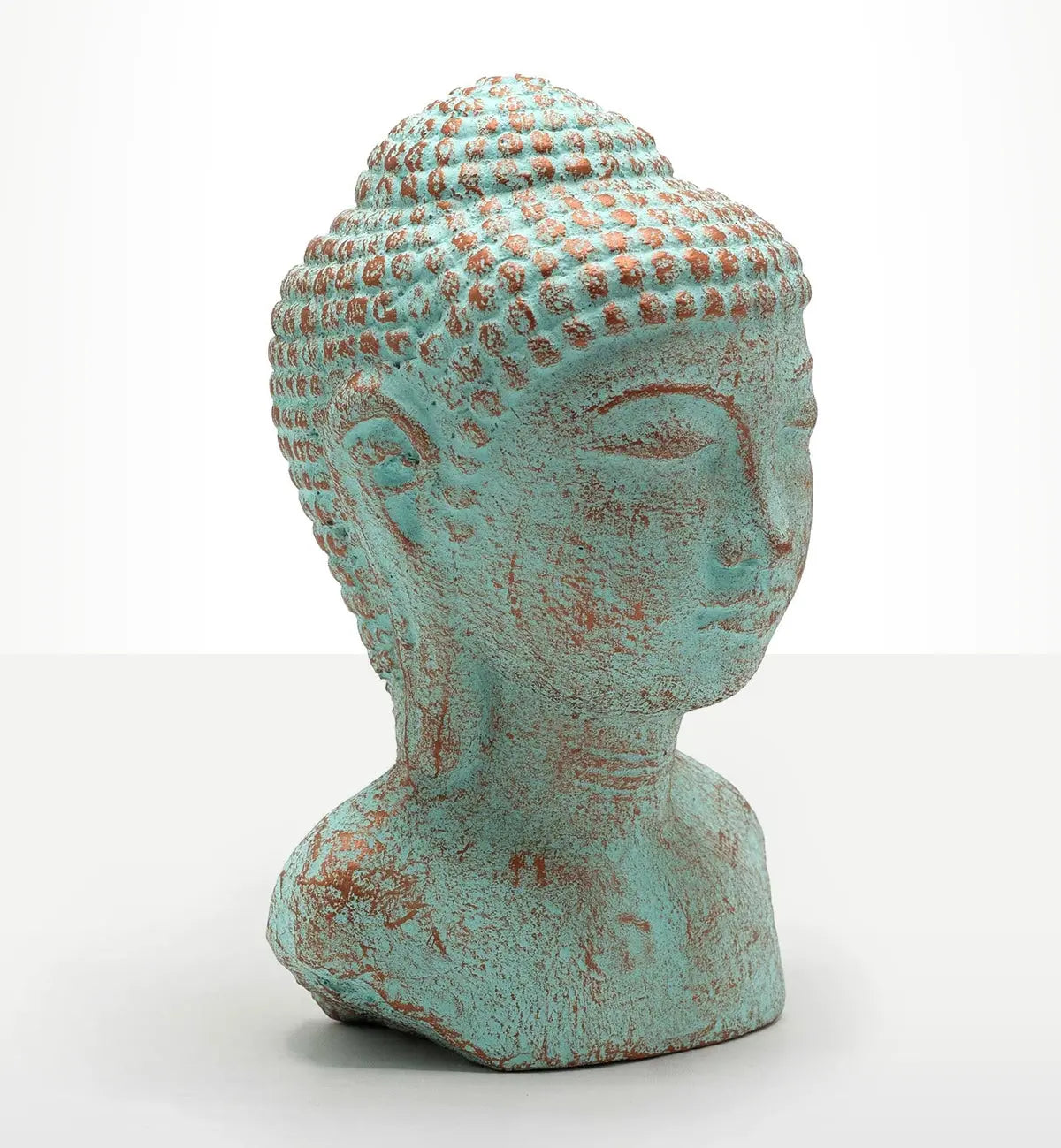 Tranquility Buddha Head - Green Copper, a serene Buddha head sculpture with an aged green copper finish, perfect as Buddha decor or a hand carved Buddha statue accent.