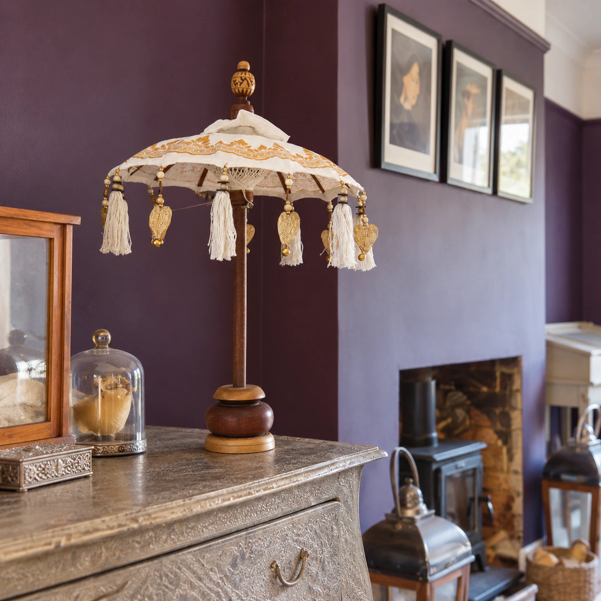 Bali Indoor Umbrella Home Decor Parasol, Canvas, Gold Decor- 40cm on a chest in a British sitting room.