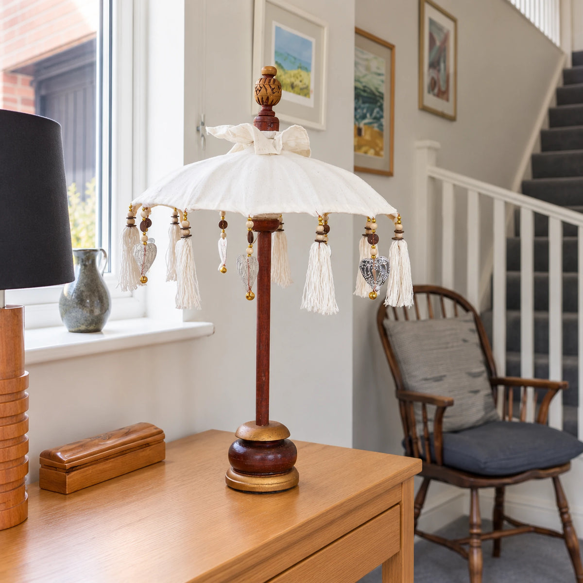 Bali Indoor Umbrella Home Decor Parasol, Canvas, Natural- 40cm on an oak console in a British hallway.