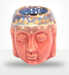 Glossy ceramic Buddha Oil Burner - Rose & Teal featuring a serene Buddha face design with soft rose pink base and teal blue accents, ideal for Buddha decor and oil diffusion.