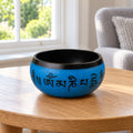 Earth Powder Tibetan Buddhist Singing Bowl - Blue Mantra Five Buddha - 16cm in a bright British sitting room
