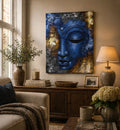 Buddha Painting - Blue Face Abstract hanging above a wooden console in a cozy living room featuring rustic decor with soft lighting and neutral tones.