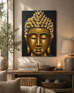 Buddha Painting - Gold Sand Finish featuring a serene golden Buddha face on a dark background, displayed in a cozy living room with natural decor and warm lighting.