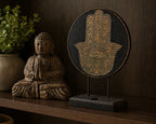 Decorative Buddha Feng Shui Set - Hamsa - Grey featuring a hand-carved Buddha statue and intricately detailed Hamsa symbol on a wooden stand, perfect for tranquil home decor.