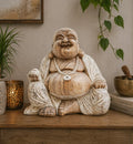 Happy Buddha - Whitewash 40cm hand carved resin statue with a joyful expression, seated pose, and whitewashed finish, styled as calming Buddha decor on wooden surface.