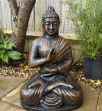 Large Antique Gold Buddha Meditation in Stupa - 1.5m hand carved statue in a peaceful garden setting, showcasing a serene brass Buddha figure in meditation pose.