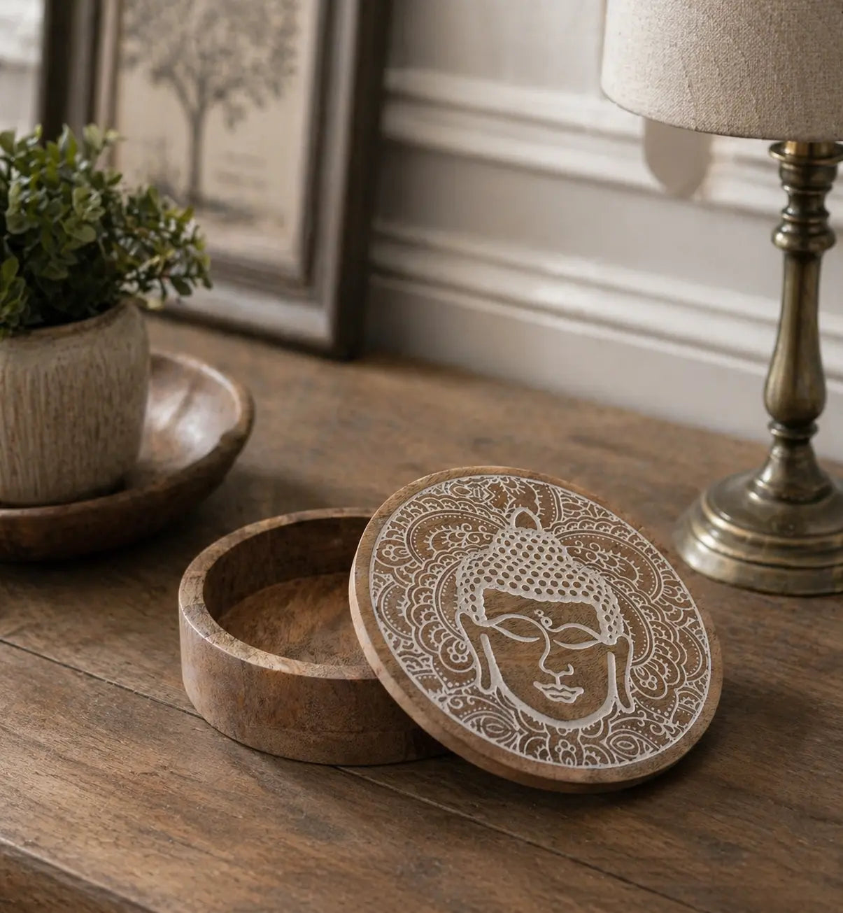 Big Round Box 17.5x7.5cm - Buddha Face Whitewash features a wooden round storage box with a carved Buddha face design in whitewash, ideal for elegant Buddha decor and tabletop display.