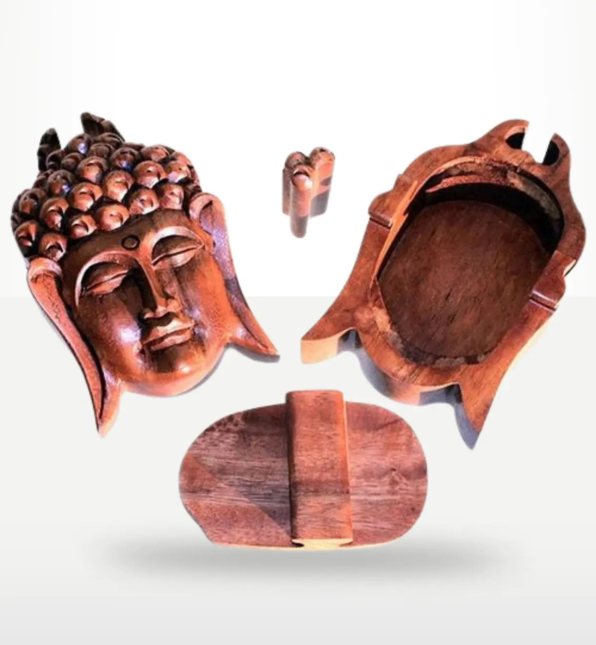 Bali Magic Box - Buddha Head made of hand-carved wood with smooth finish, featuring a hollowed interior for storage and removable lid shaped like a Buddha head.
