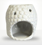 Ceramic Buddha Oil Burner - White with textured surface and open front cavity designed for holding oil or wax to diffuse fragrance, featuring small ventilation holes.