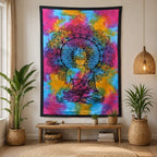 Single Cotton Bedspread + Wall Hanging - Peaceful Buddha featuring a vibrant, multicolored tie-dye design with a detailed meditating Buddha surrounded by mandala patterns, displayed in a cozy, natural-toned living space.